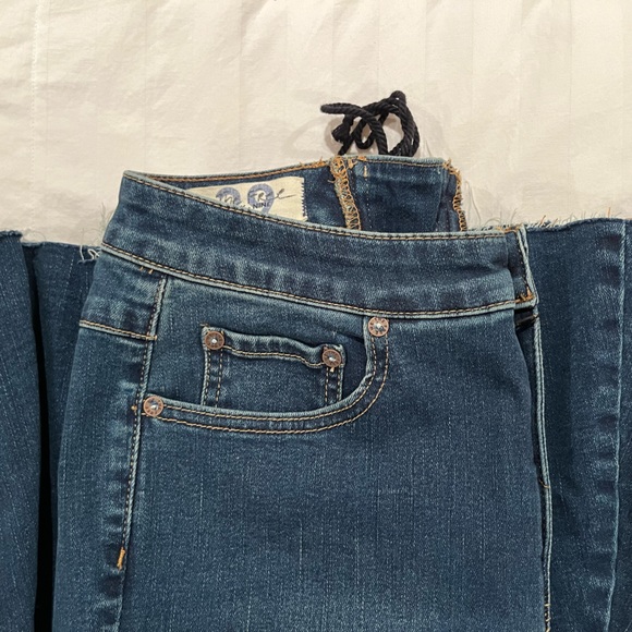 Free People CRVY Super High-Rise Lace-Up Flare. Color Worn Dark. - Picture 1 of 4